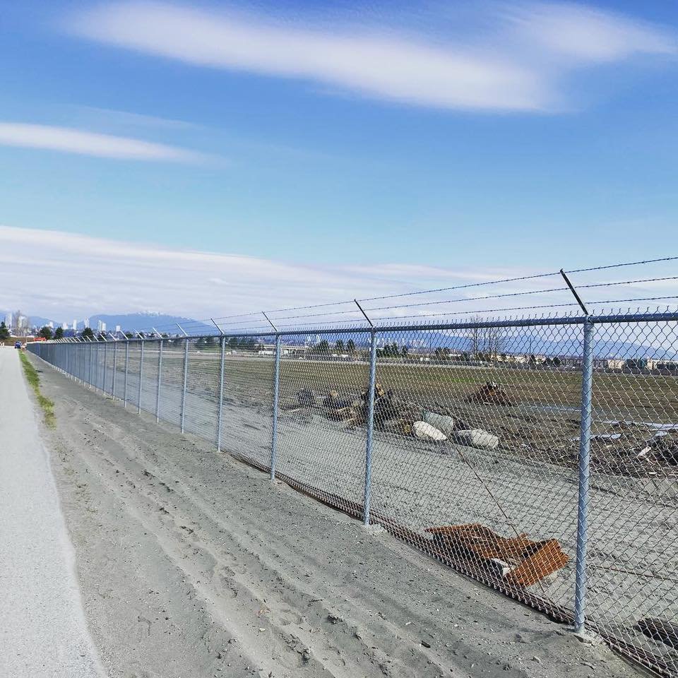 Galvanized perimeter chain link fencing from the LS Fencing project gallery.